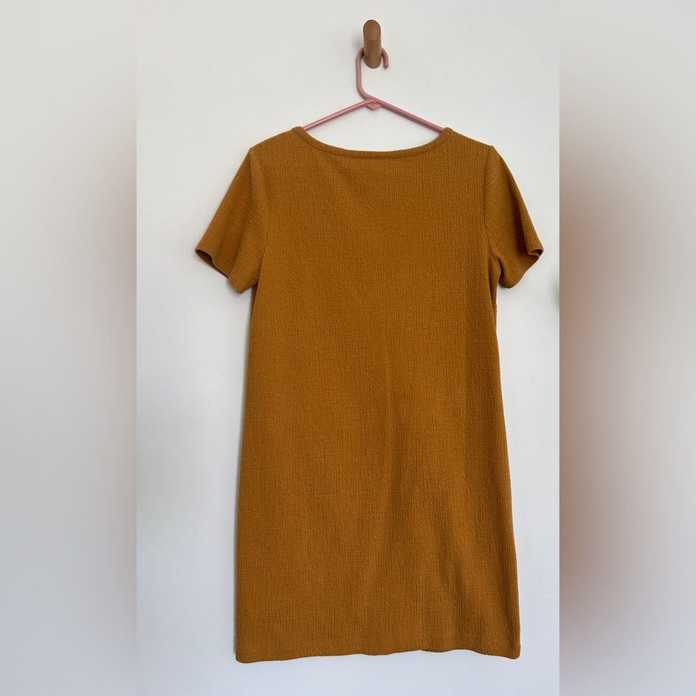Cynthia Rowley 1960's style stretch tshirt dress with slash pockets in mustard